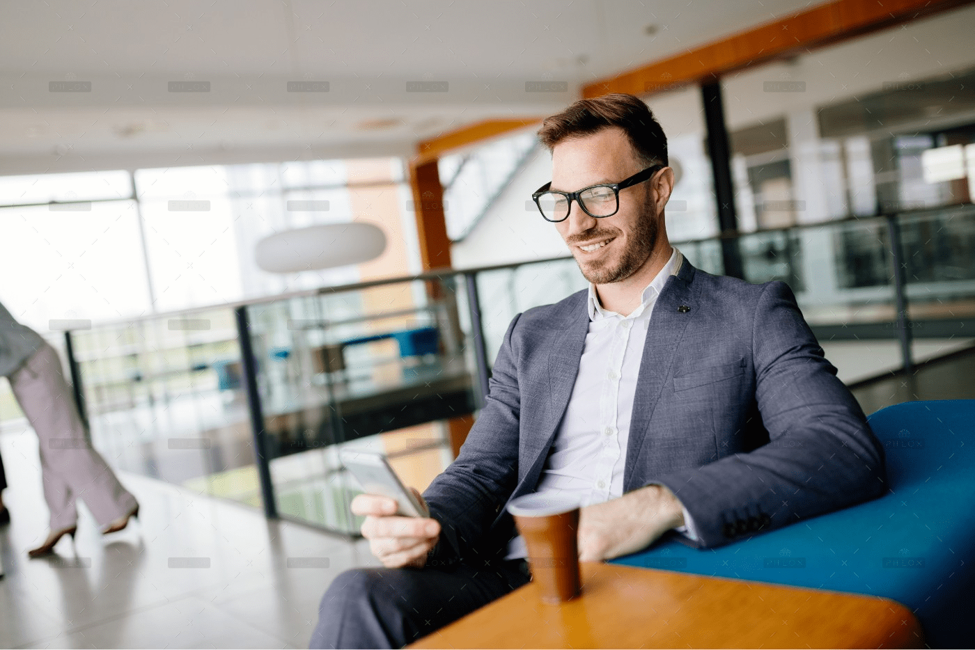 demo-attachment-2831-businessman-taking-a-break-with-a-cup-of-coffee-JW4B3DH